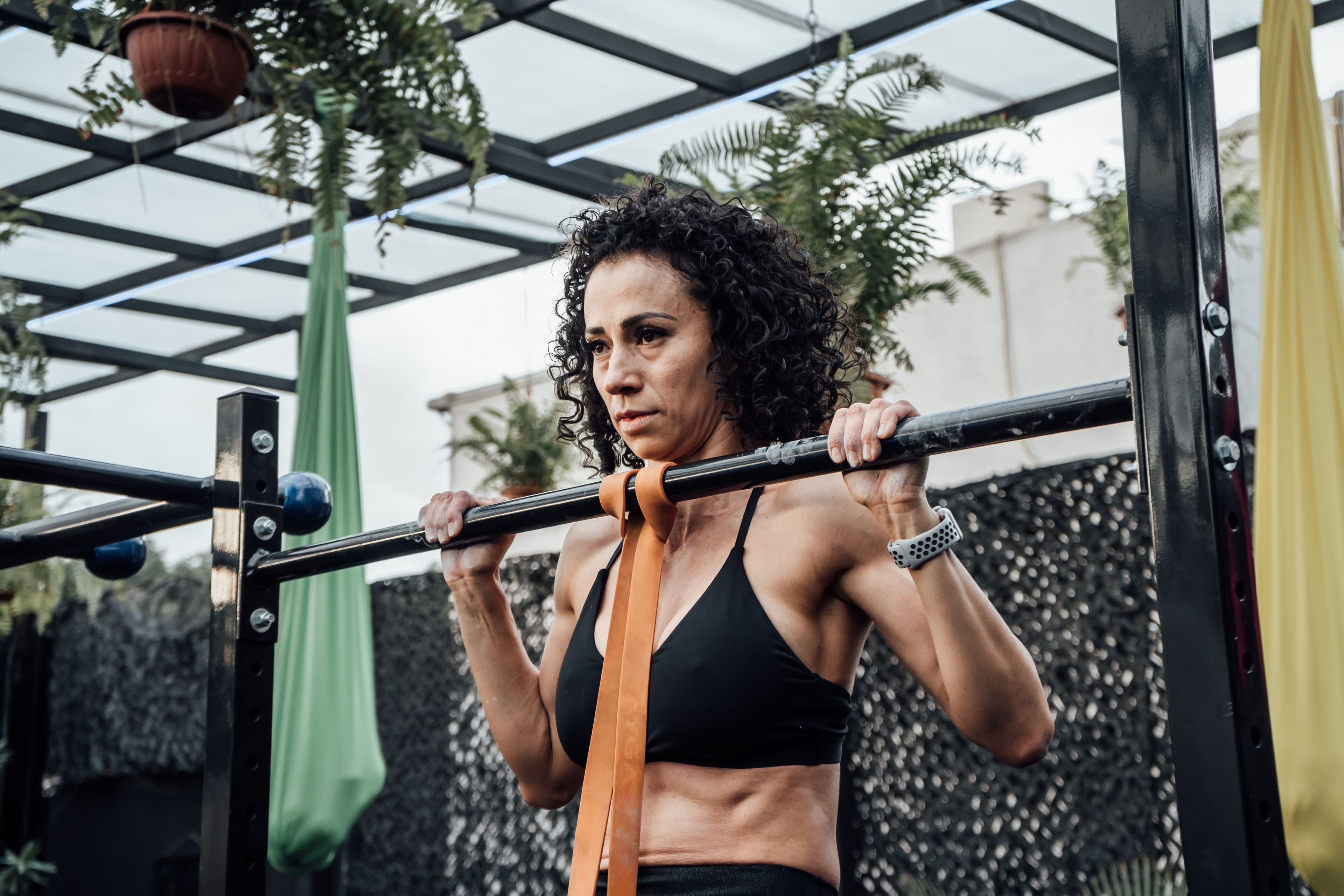 An adult athlete practicing a bodyweight movement
